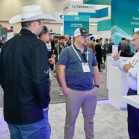 JST Power Equipment team engaging with attendees at DISTRIBUTECH 2025