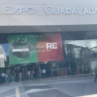 Expo Guadalajara welcomes attendees to Ecomondo Mexico and RE+ Mexico 2025, a major event for sustainable energy and environmental innovation. Entrance of Expo Guadalajara with a large banner promoting for Ecomondo Mexico and RE+ Mexico 2025